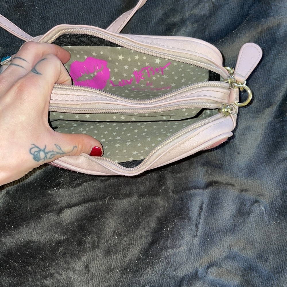 Used Betsey Johnson cross-body bag.